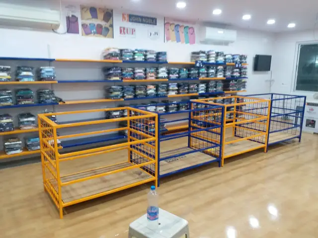 Garment Showroom Fit-out manufactured and installed by Shree Laxmi Rack Solutions